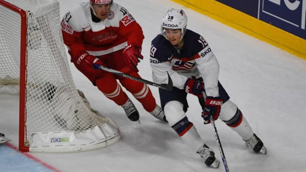 Clayton Keller In Action During A Hockey Game Background