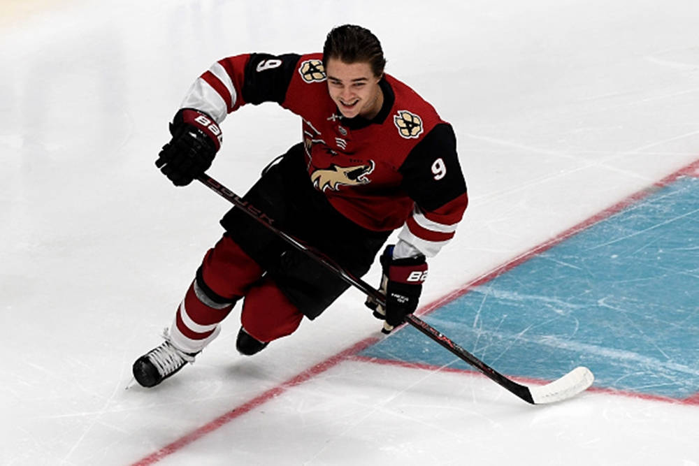 Clayton Keller Skating Ice Hockey Arena Background