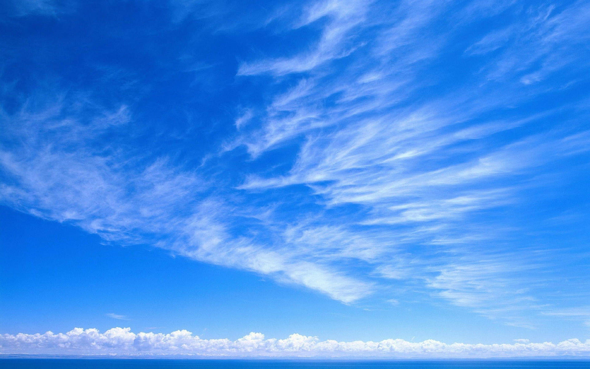 Clear Sky With Wispy Clouds Background