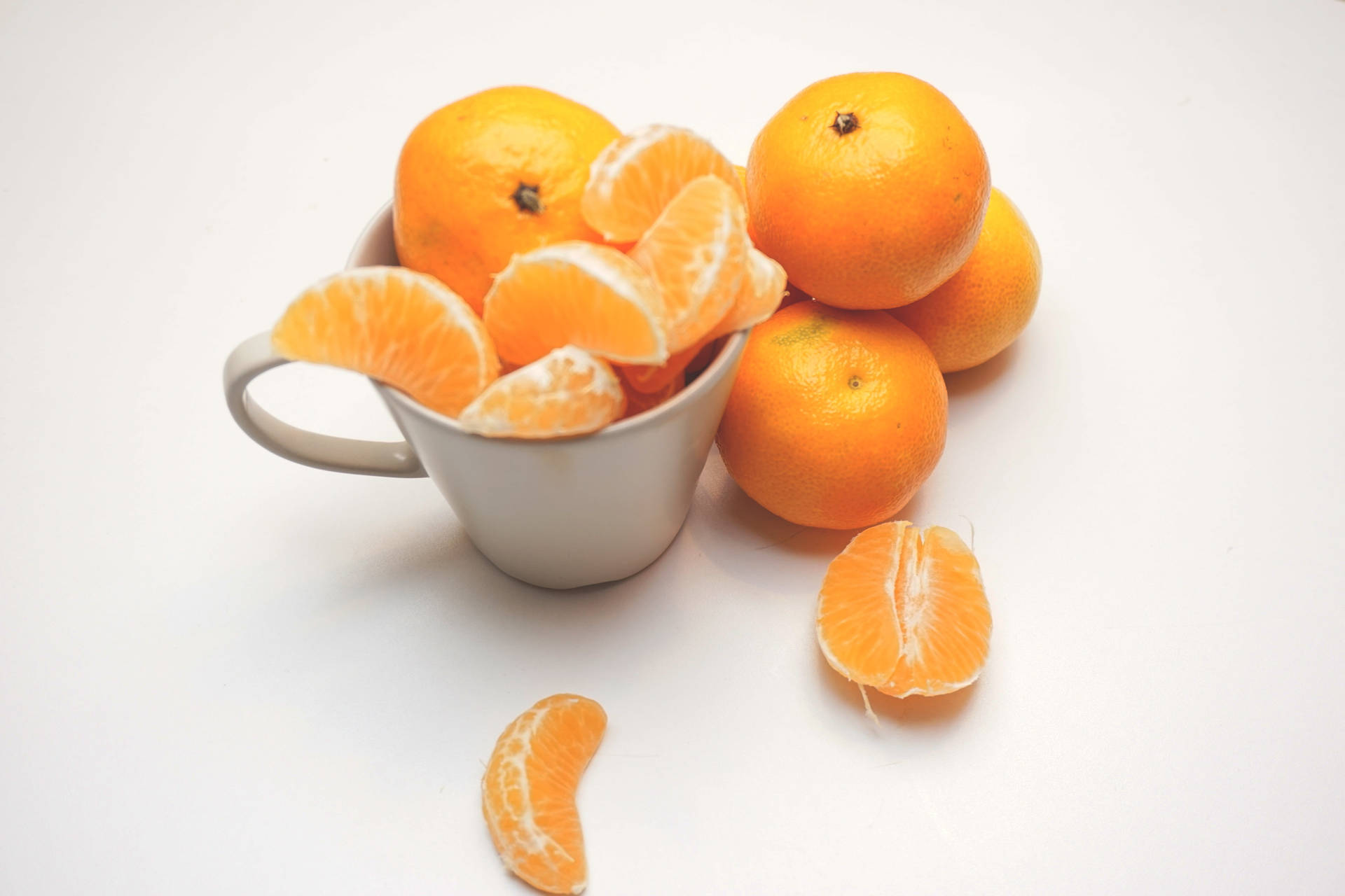 Clementine Citrus Fruits Overloading On Cup