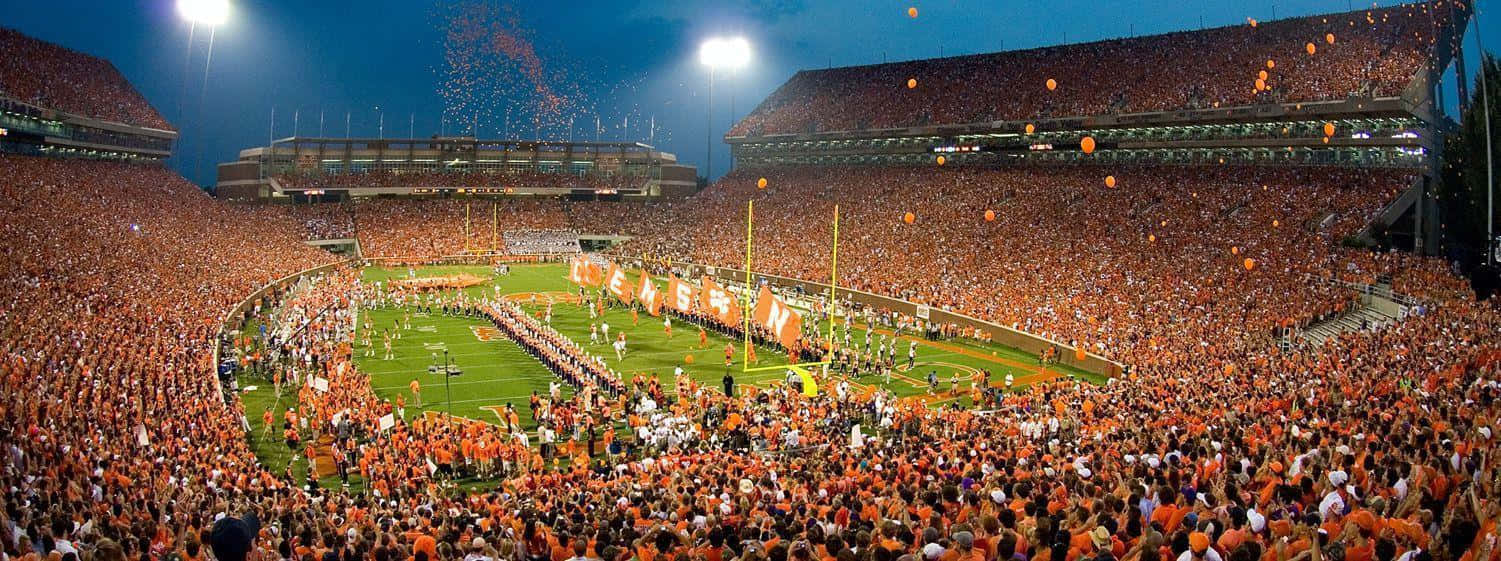 Clemson Tigers Football Football Fans Marching Band Background