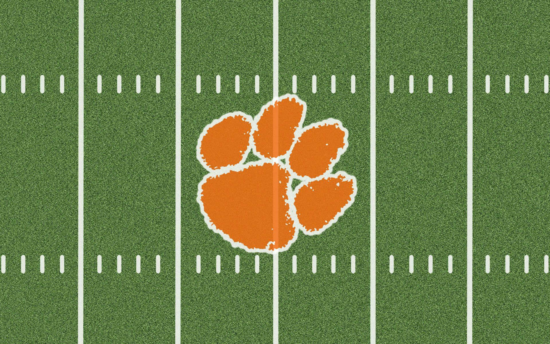 Clemson Tigers Football Logo On Field Background