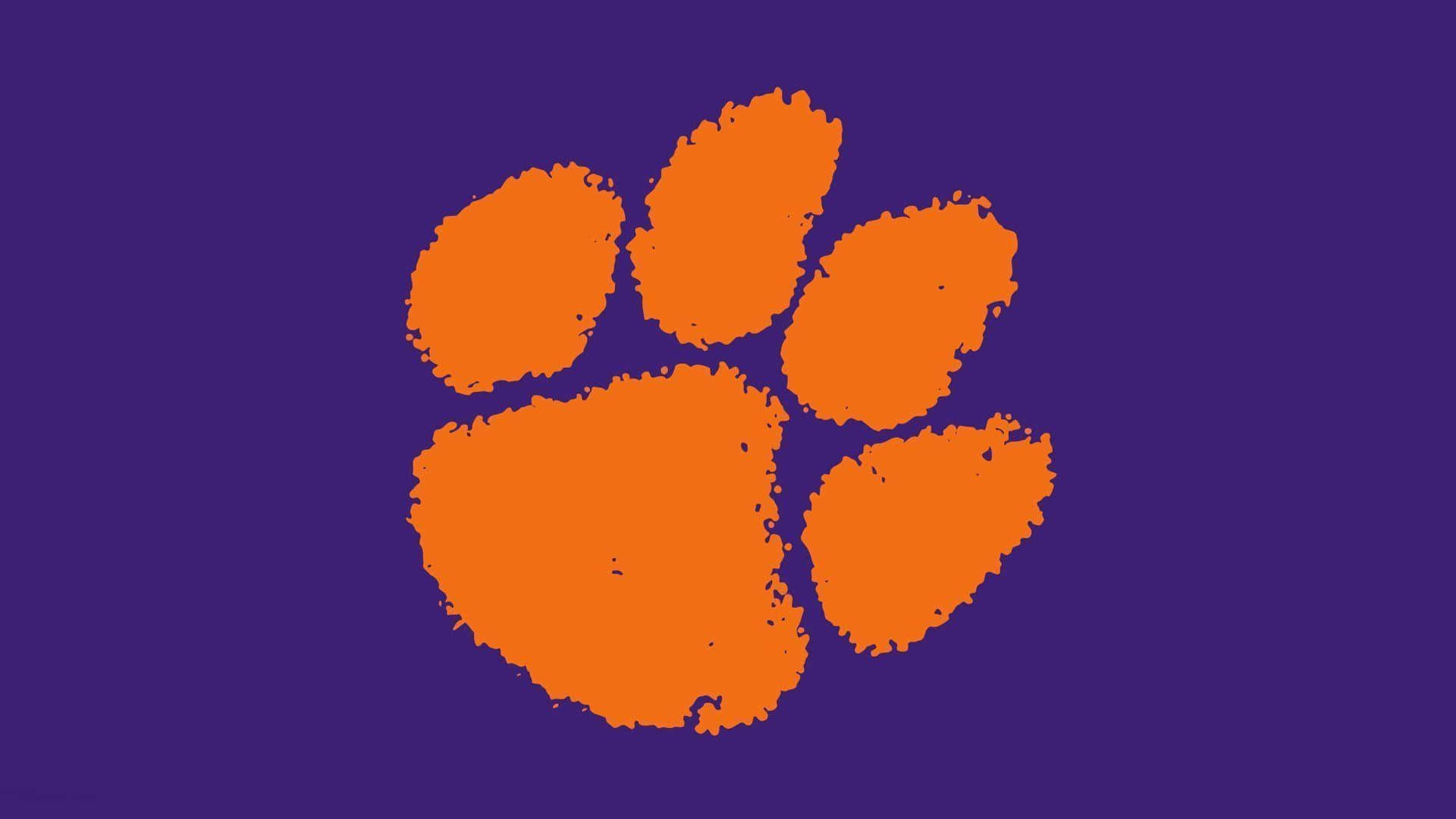 Clemson Tigers Football Orange Paw Print Logo Background