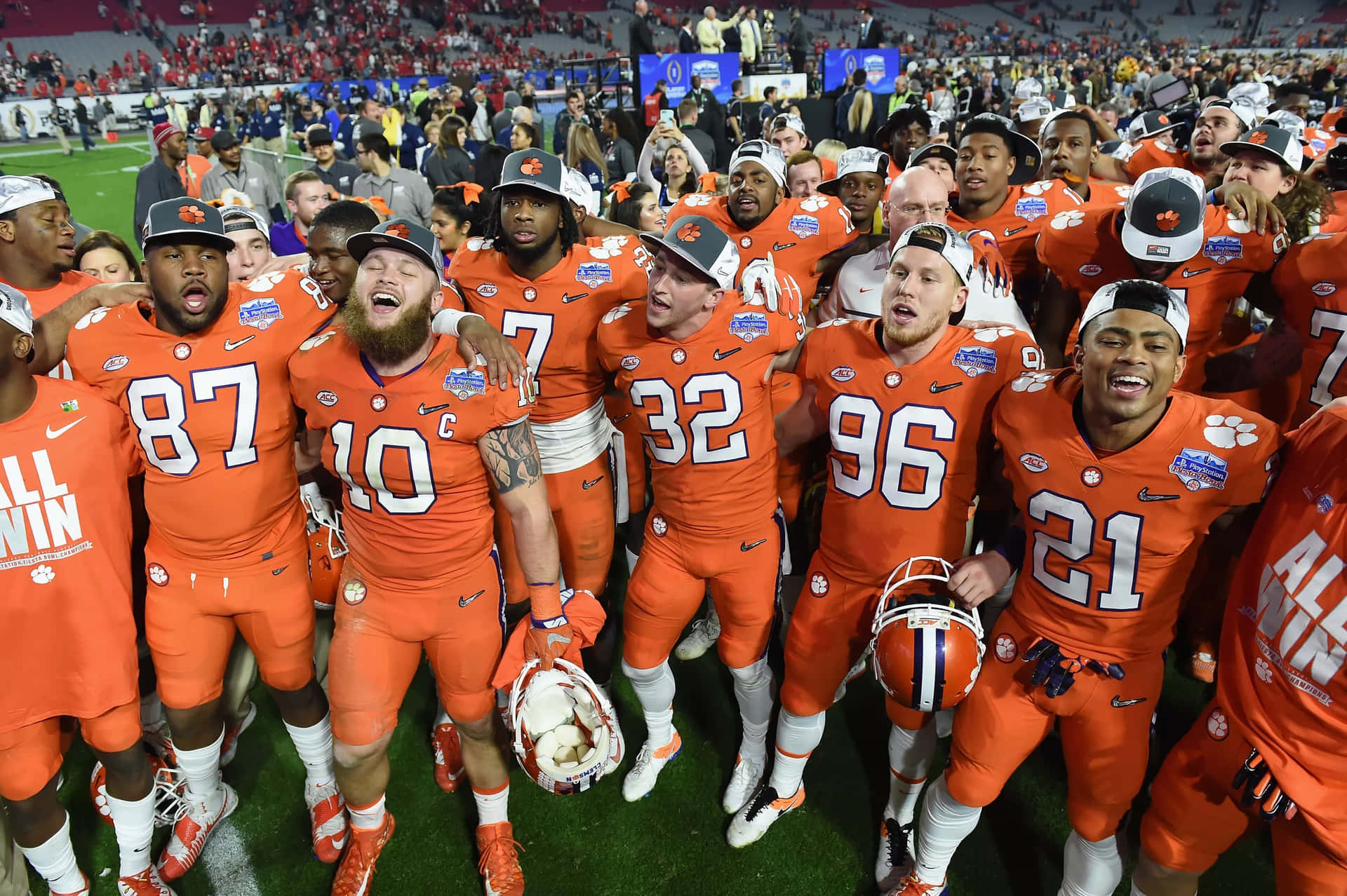 Clemson Tigers Football Team Against The Alabama Crimson Tide Background