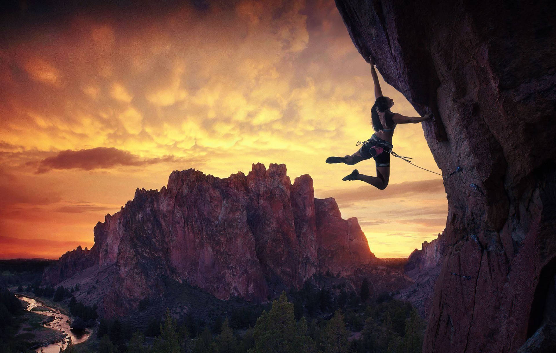 Climbing Female With Setting Sun Background