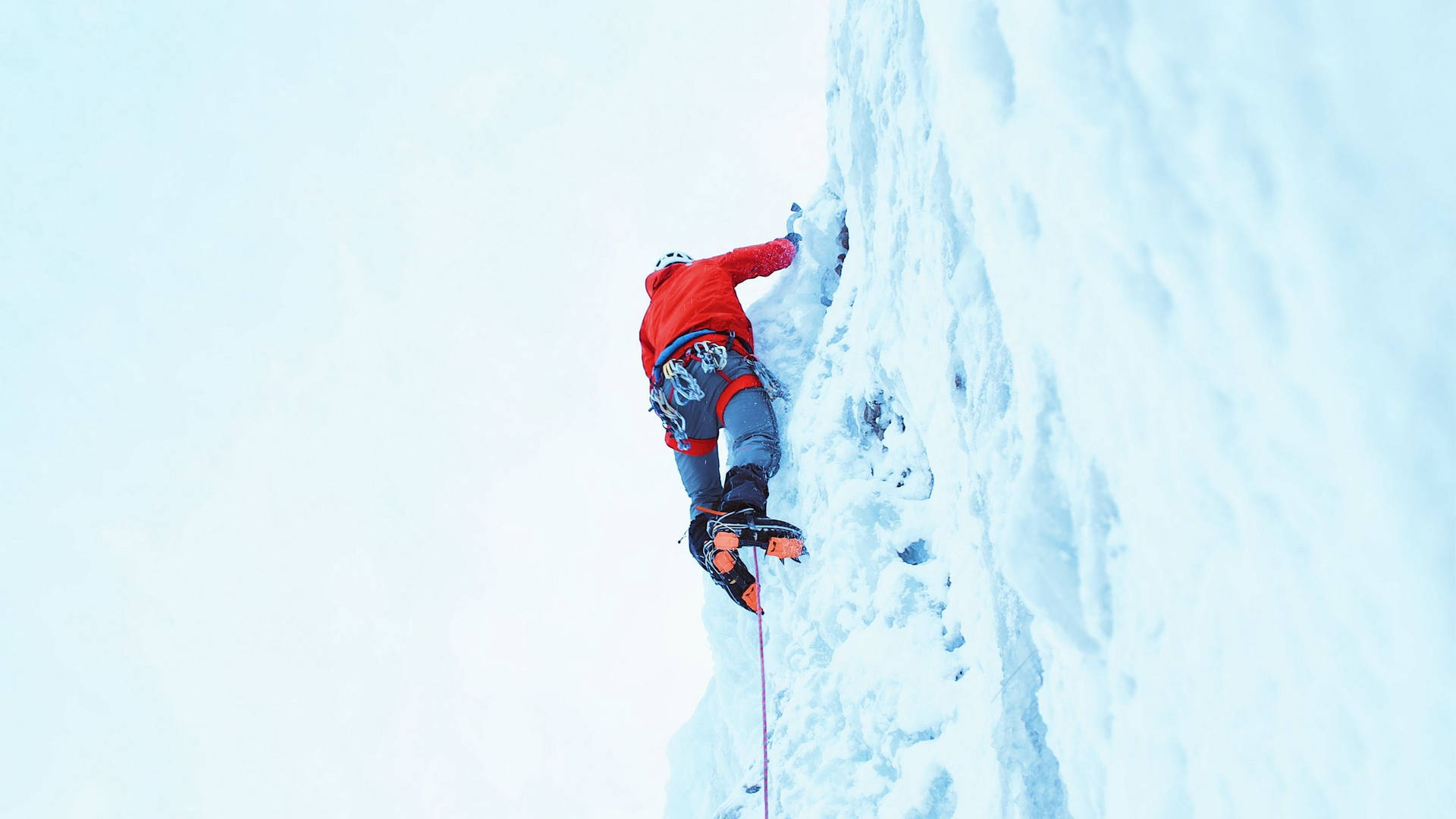 Climbing In Bright Red Jacket Background