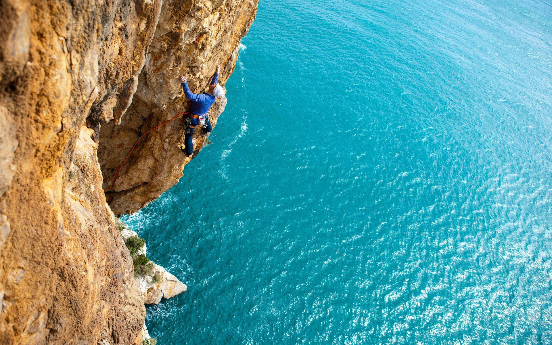 Climbing Man On A Cliff Background