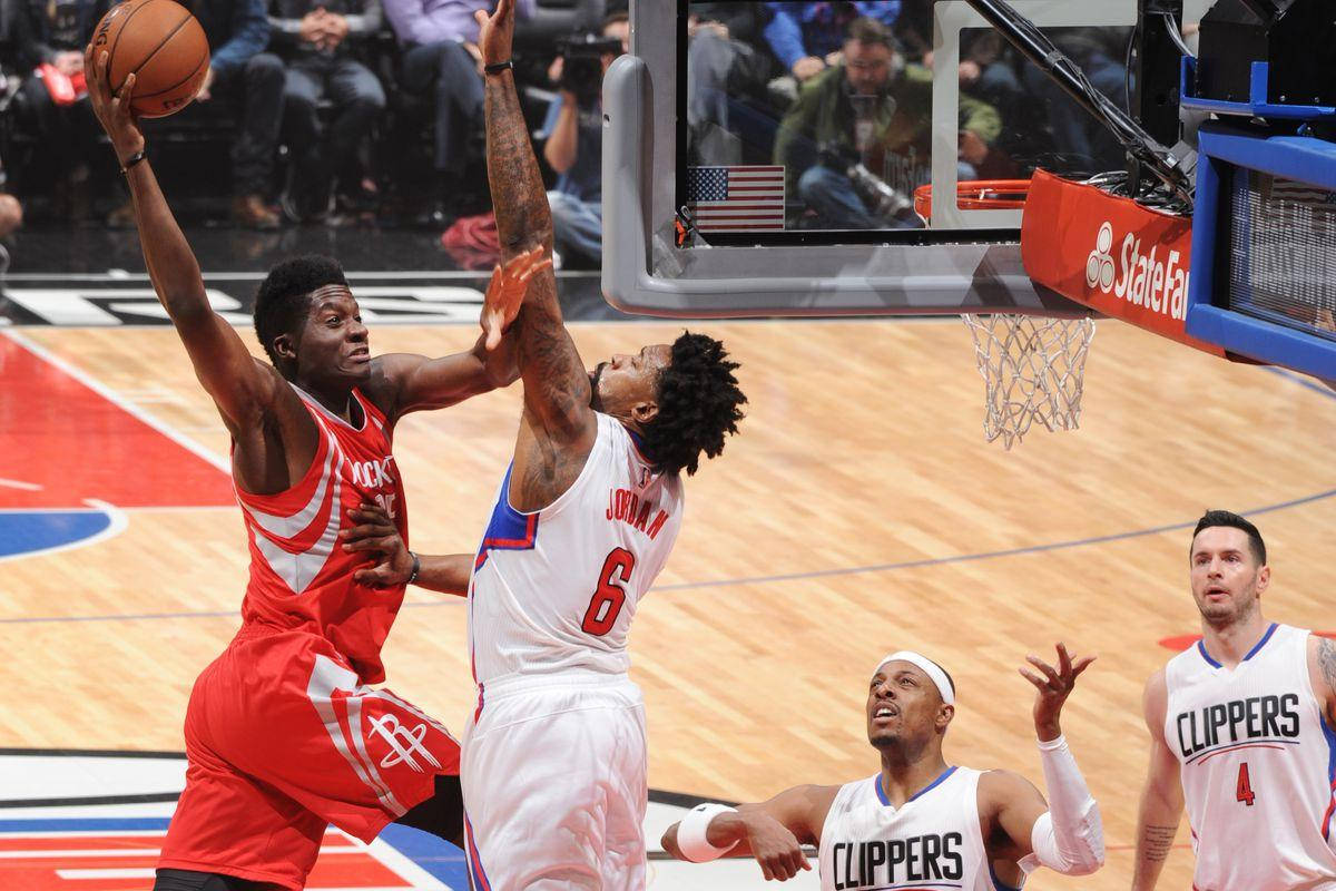 Clint Capela Intense Game With Clippers Background