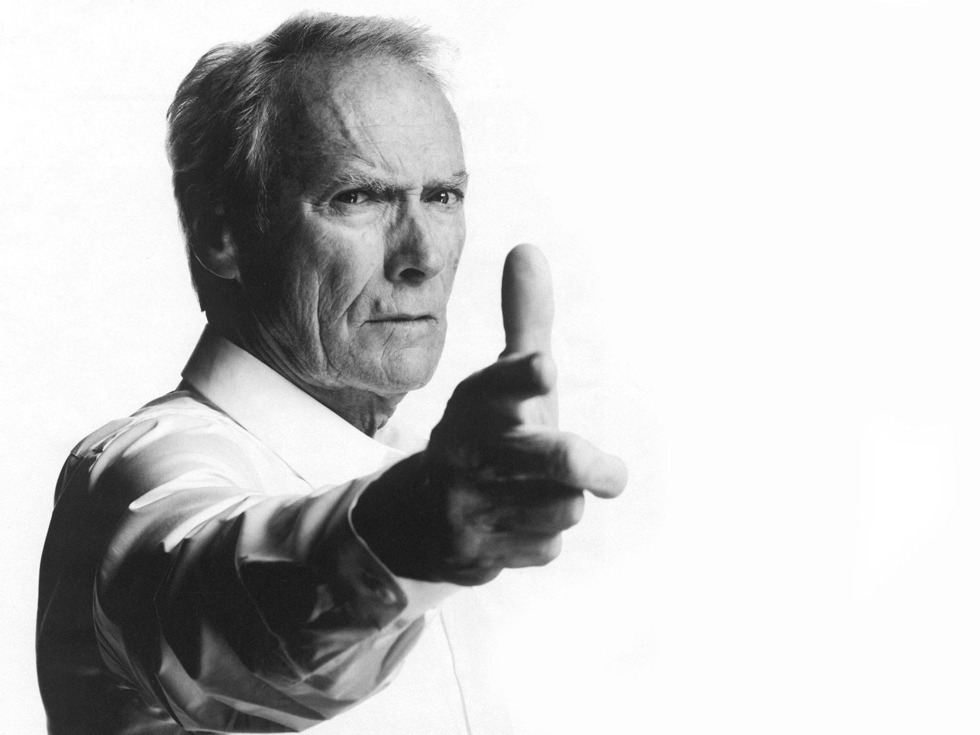 Clint Eastwood Famous Finger-guns Pose Background