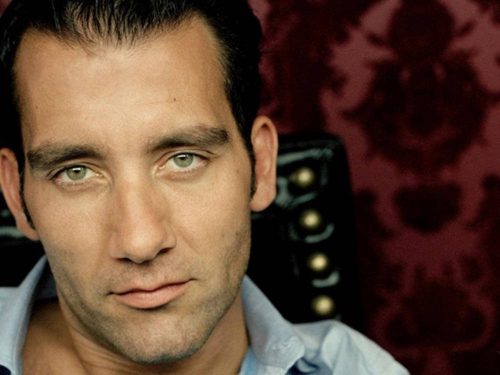 Clive Owen - Charisma Personified In Red Background