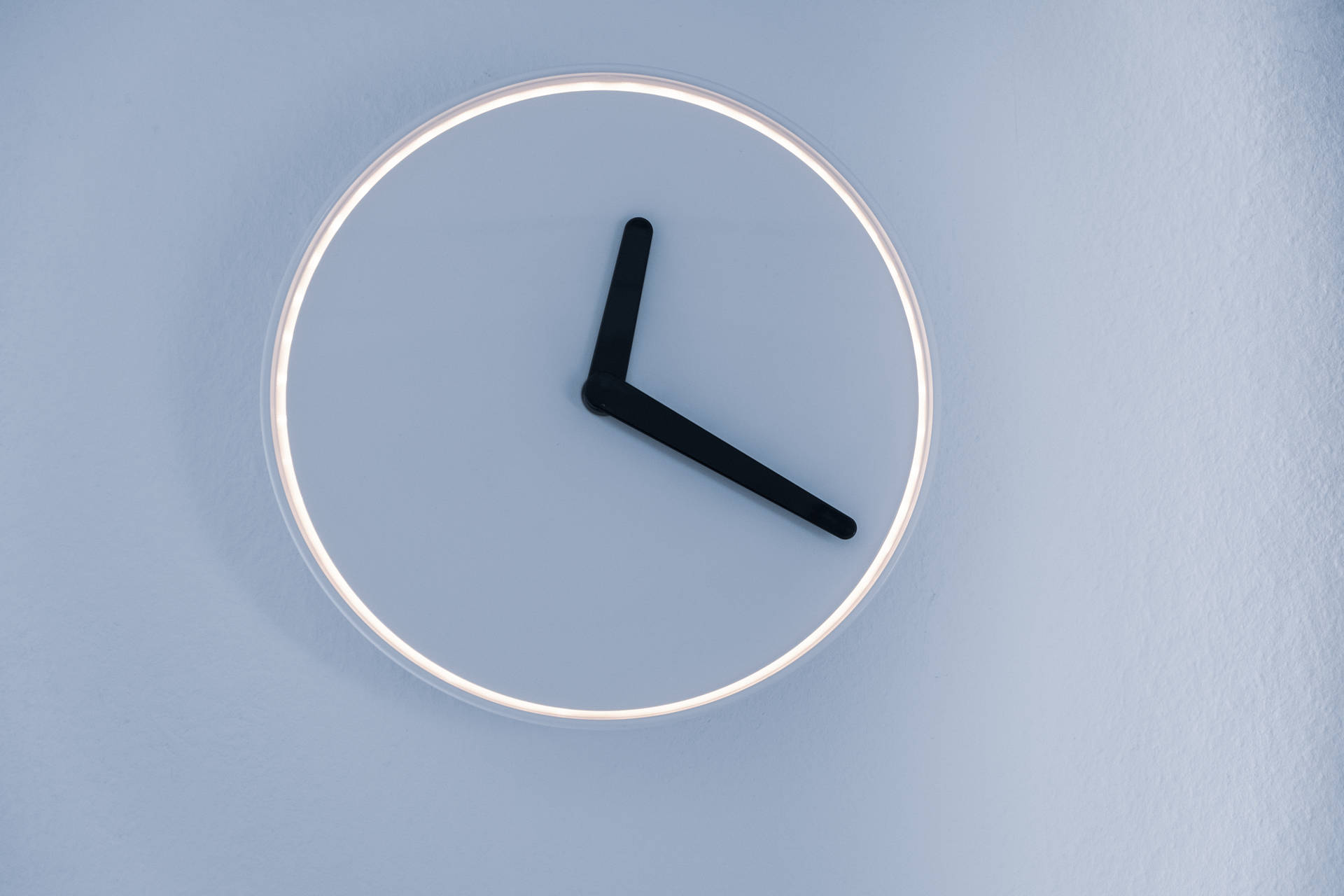 Clock Mounted On Blue Wall