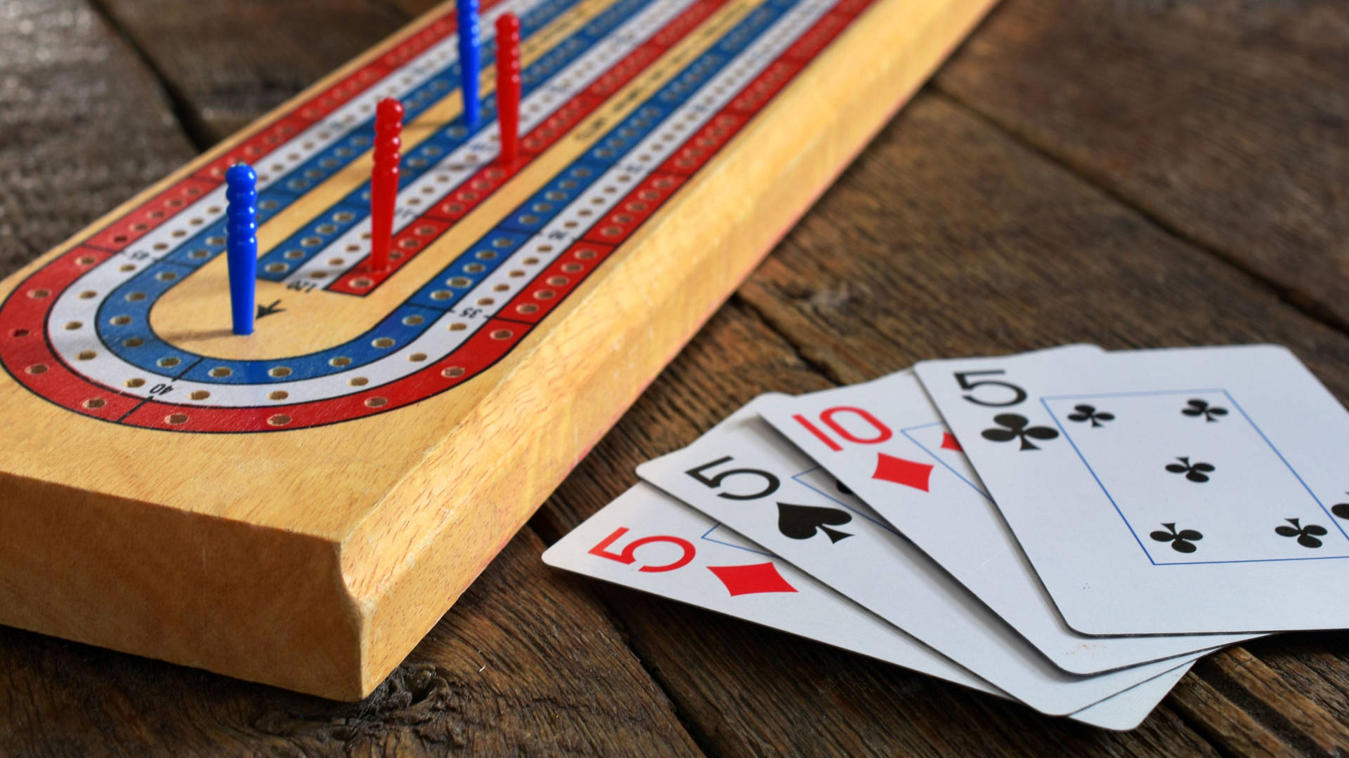 Close-up Cribbage Board Cards Beside