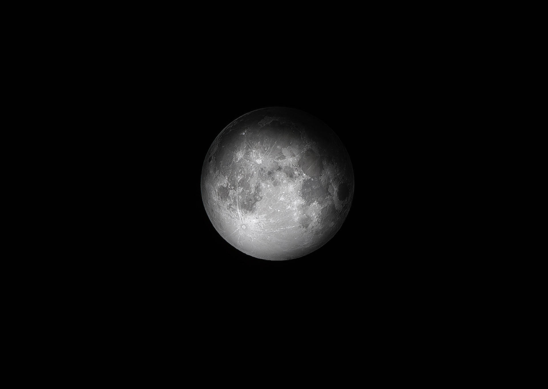 Close-up Full Moon On Black Desktop