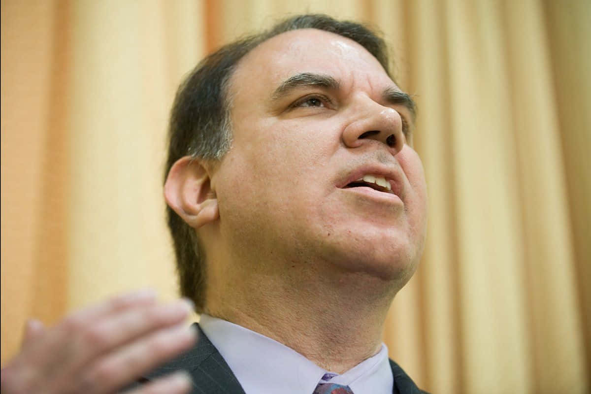 Close Up Head Alan Grayson Background