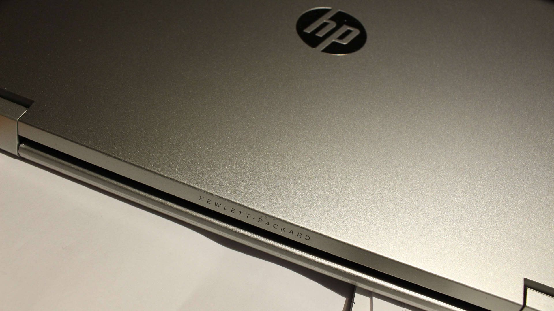 Close-up Hp Laptop With Logo Background