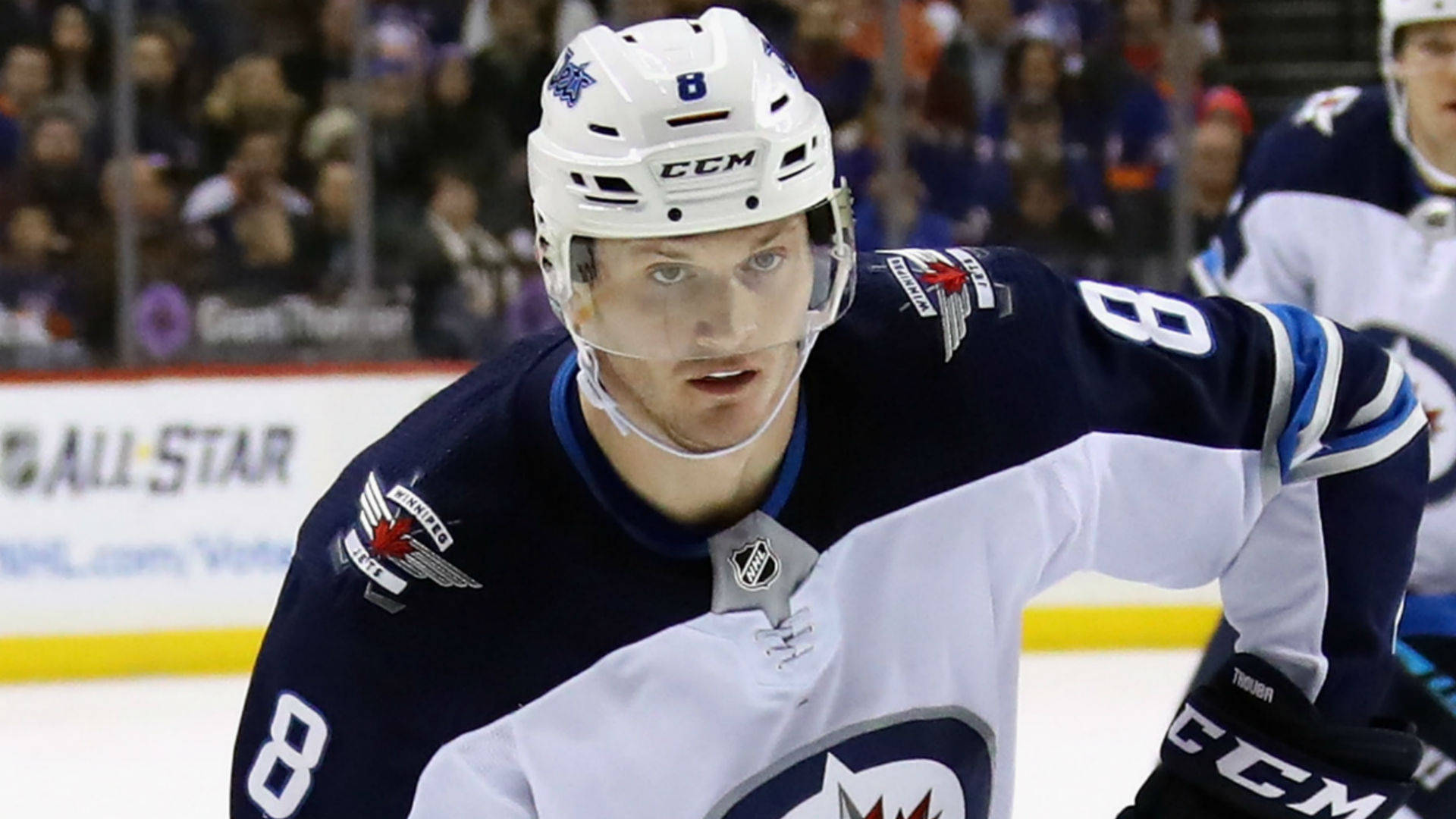 Close Up Look Of Jacob Trouba Focusing During Game Background