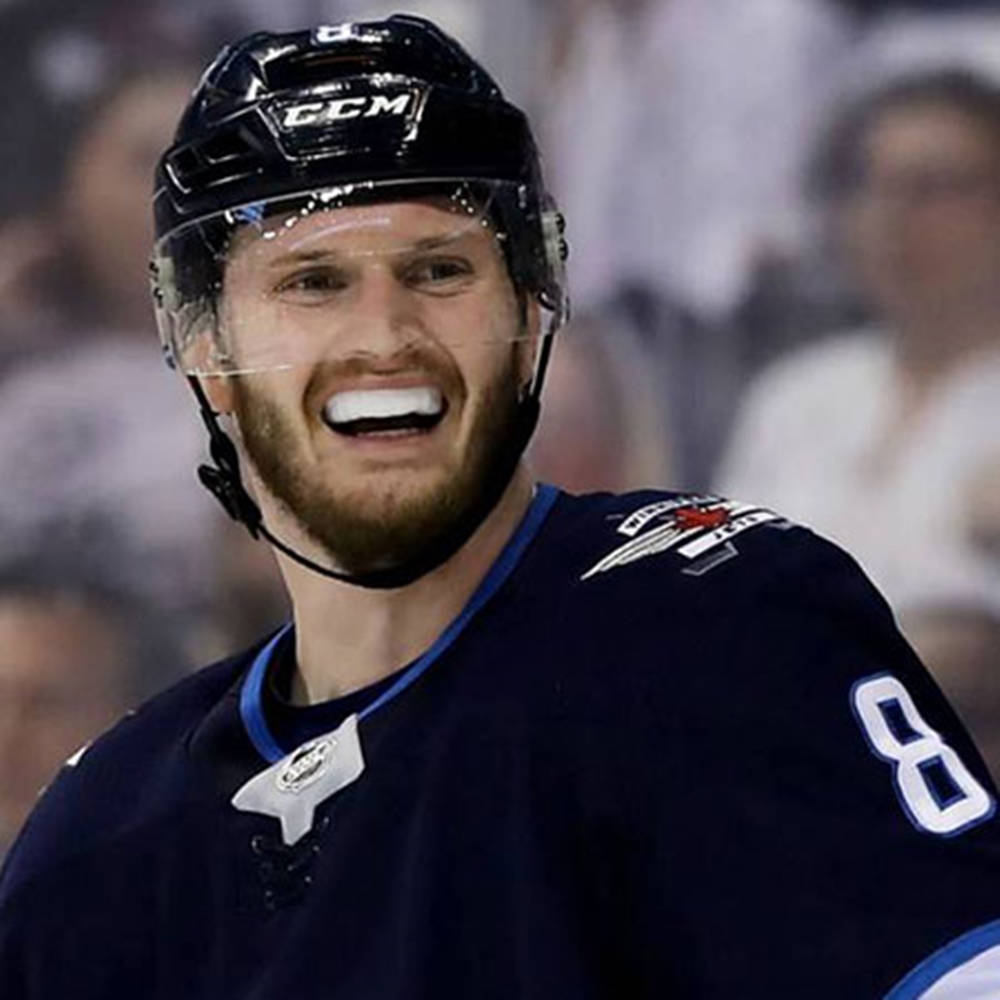 Close Up Look Of Jacob Trouba Smiling While Wearing Protective Mouthpiece Background