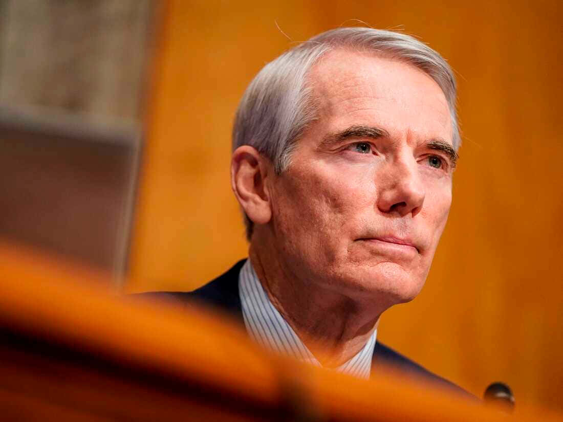 Close-up Low-angle Rob Portman Background