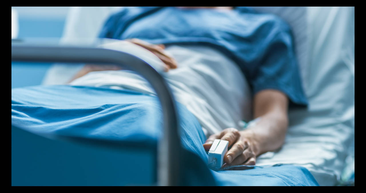 Close-up Of A Patient In Hospital Bed Background