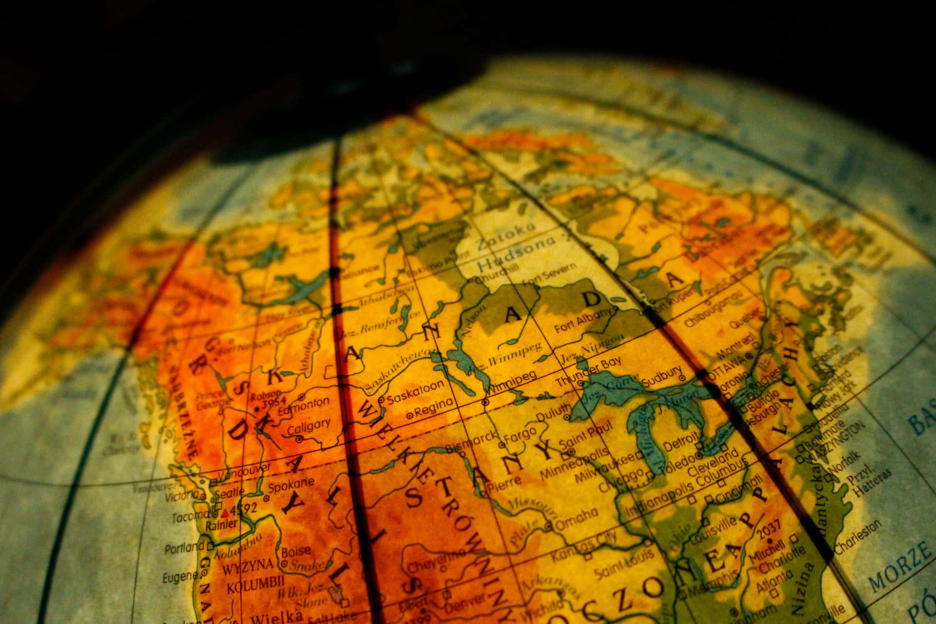 Close-up Of Glowing Globe Map Background