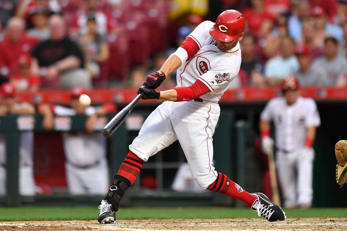 Close-up Of Joey Votto Hitting Baseball Background