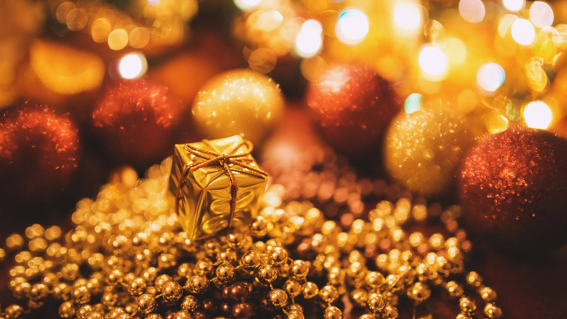 Close-up Of Red And Gold Festive Christmas Gift Background