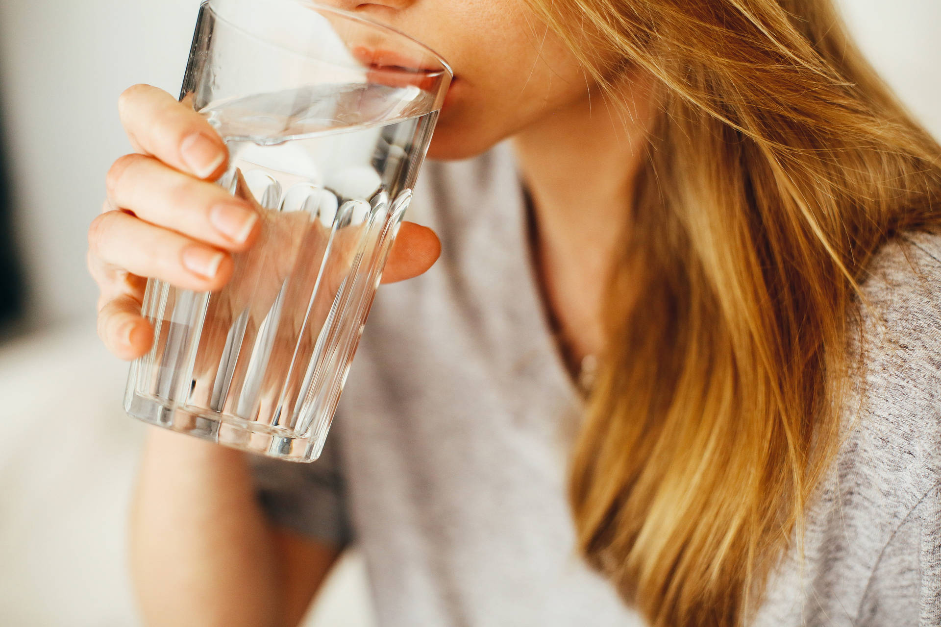 Close-up Of Woman Drinking Water Background