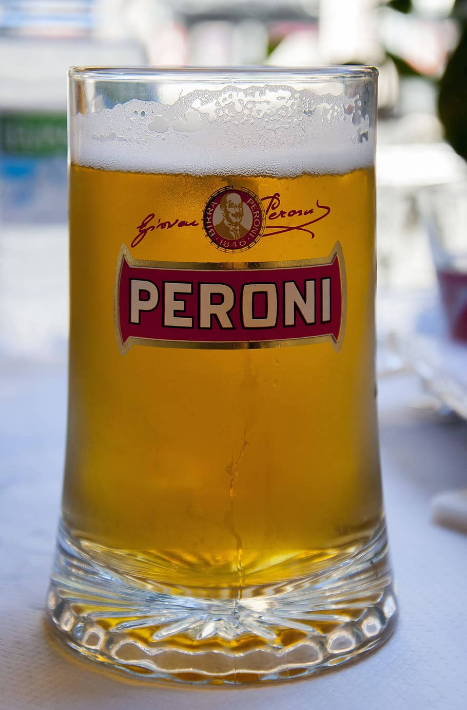 Close-up Photo Of A Peroni Beer In A Mug Background