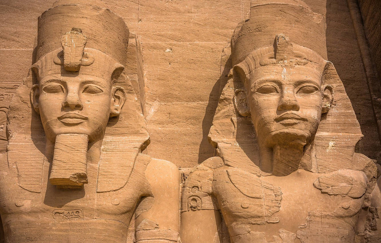 Close-up Photo Of The Statues Of Abu Simbel Temples Background