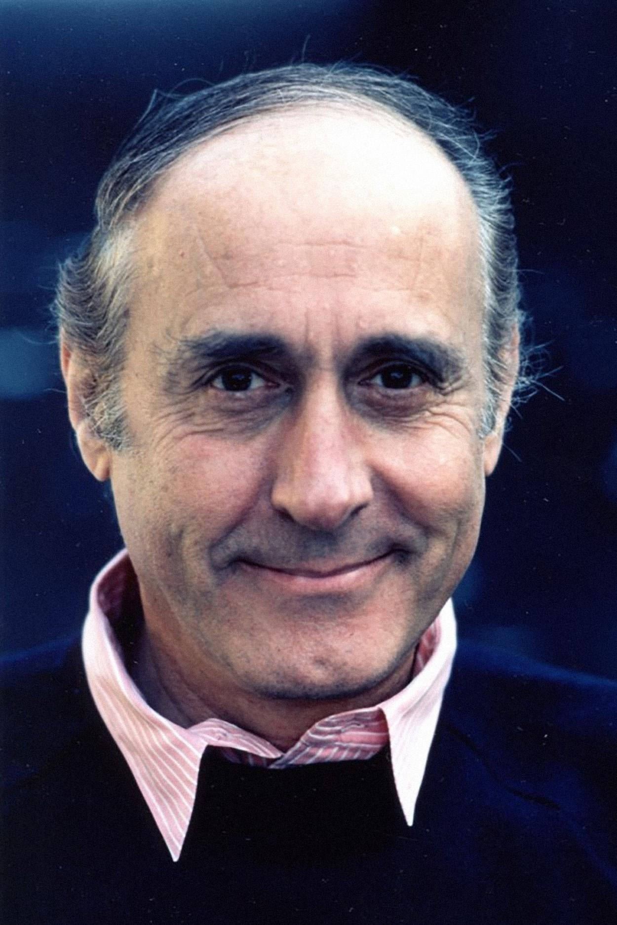 Close-up Portrait Of Famed American Composer Henry Mancini Background