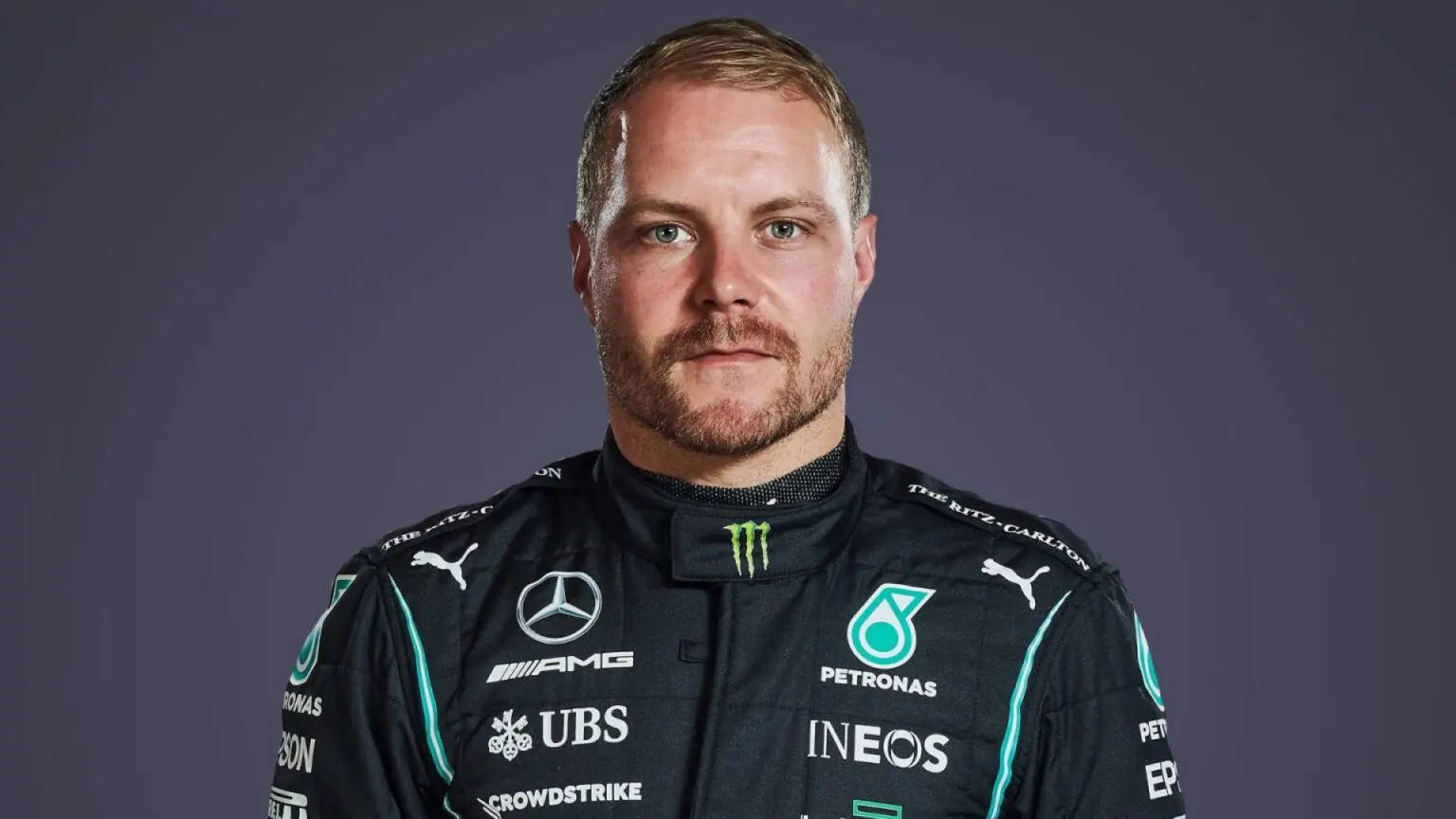 Close-up Portrait Of Valtteri Bottas, The Renowned Formula 1 Racer. Background