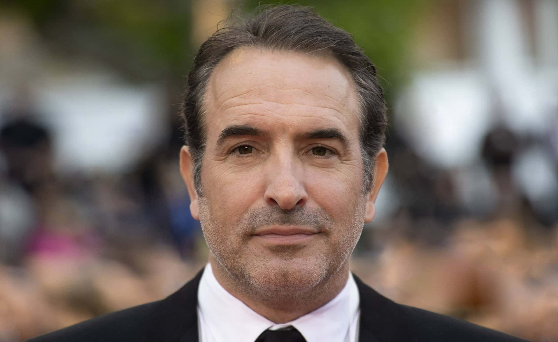 Close-up Shot Of Award-winning Actor Jean Dujardin Background