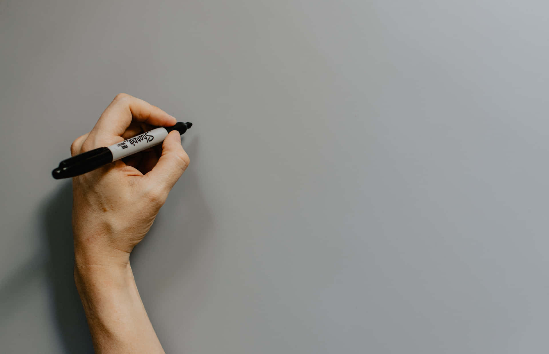 Close-up Shot Of Handwriting With Permanent Marker Background