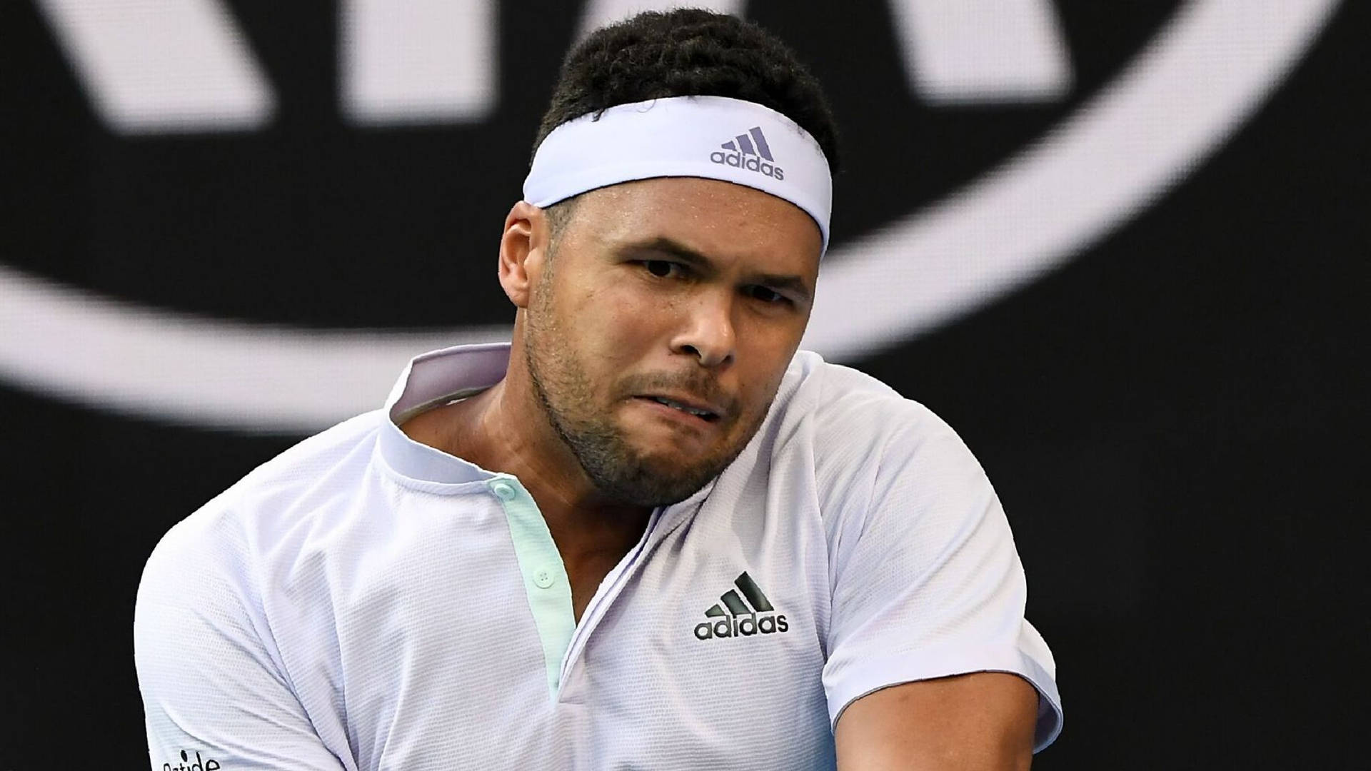 Close-up Shot Of Jo-wilfried Tsonga Showing Determination Background