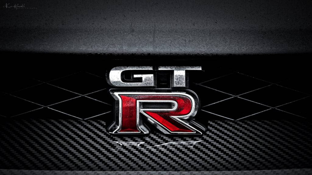 Close-up View Emblem Of Nissan Gt R 4k Background