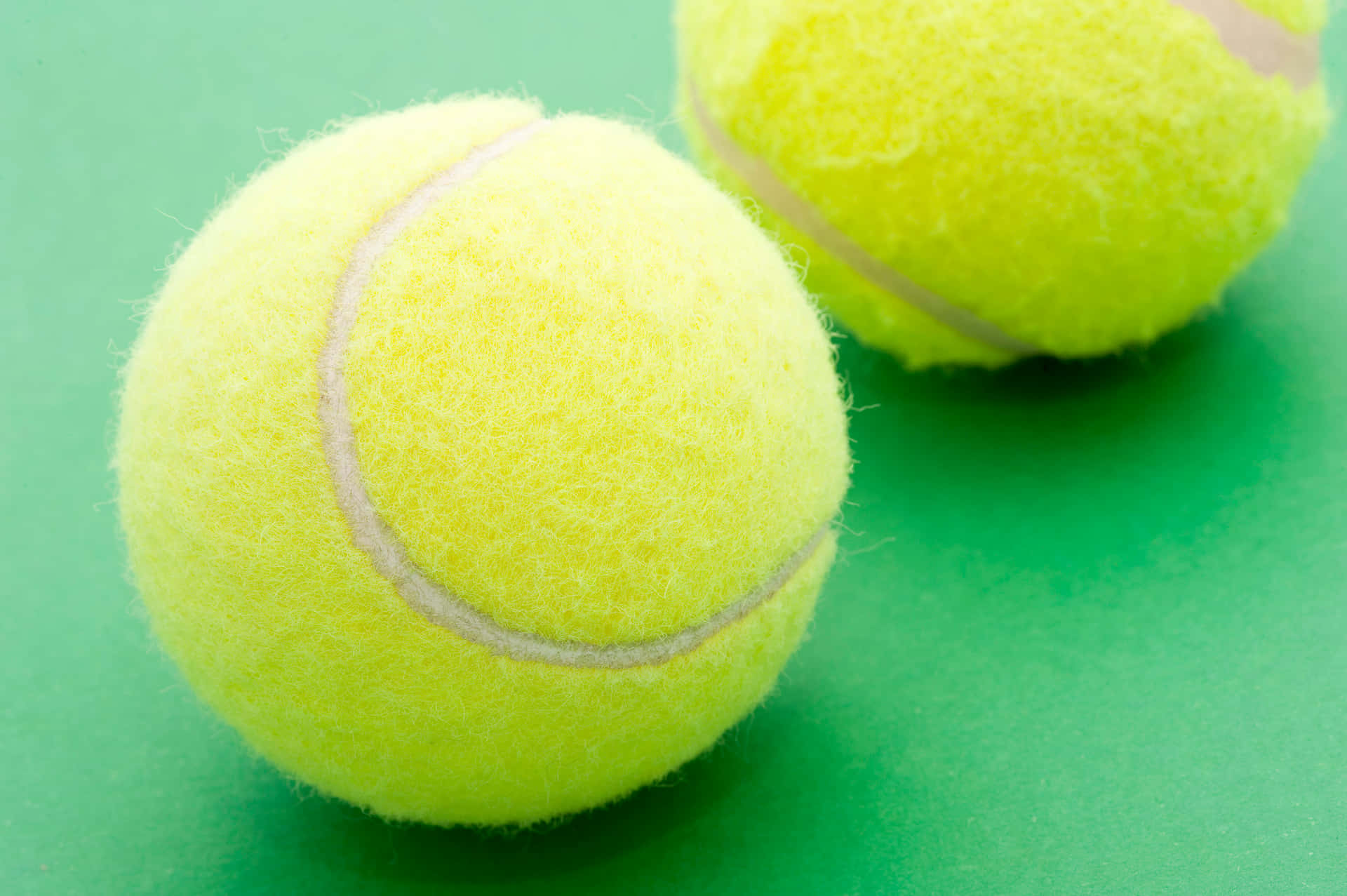 Close-up View Of A Tennis Ball Background