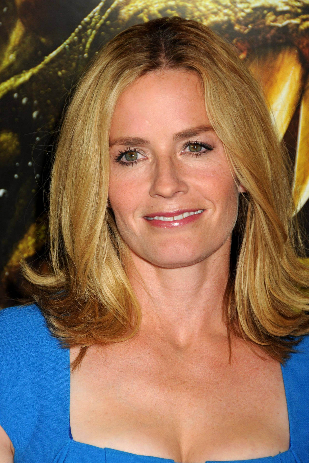 Close Up View Of Elisabeth Shue With Straight Blonde Hair Smiling Background