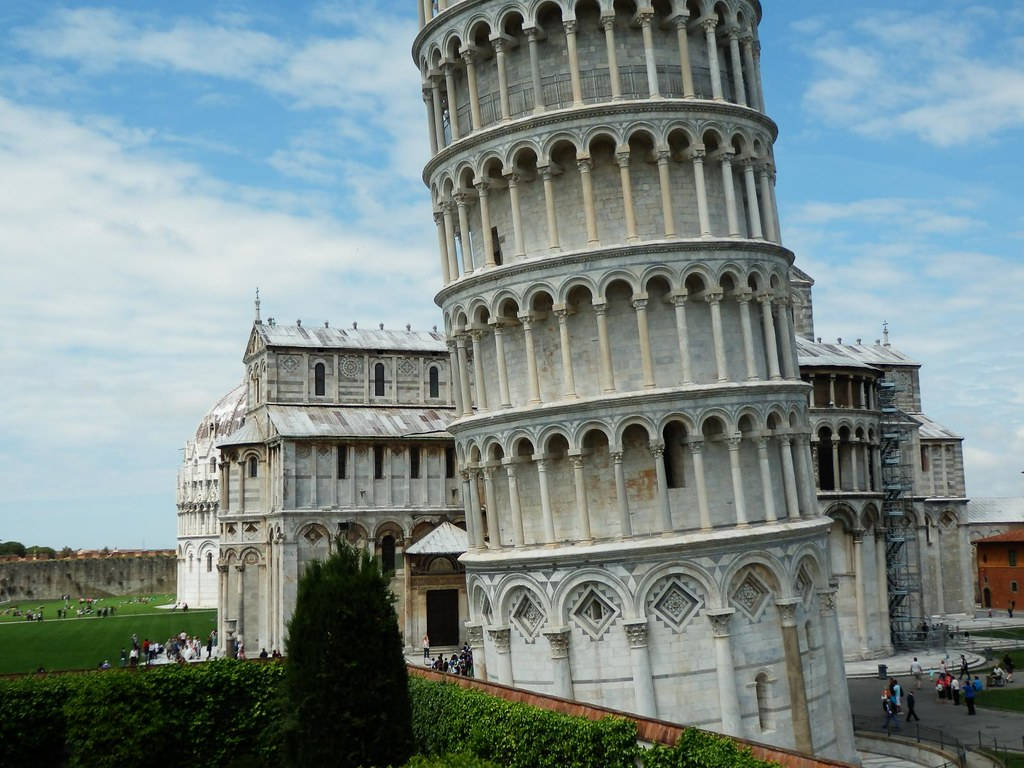 Close-up View Of The Magnificent Leaning Tower Of Pisa During Daylight Background