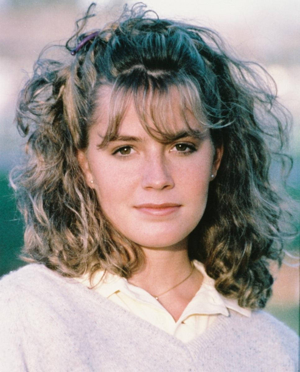 Close Up View Of Young Elisabeth Shue Smirking Background