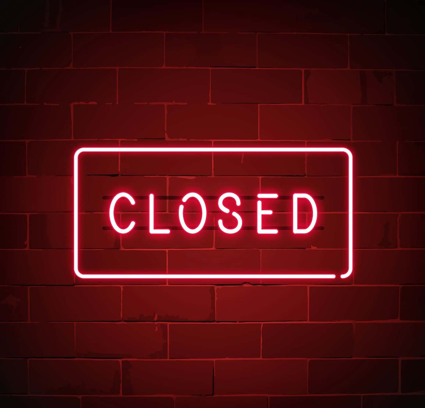 Closed Neon Sign On Brick Wall