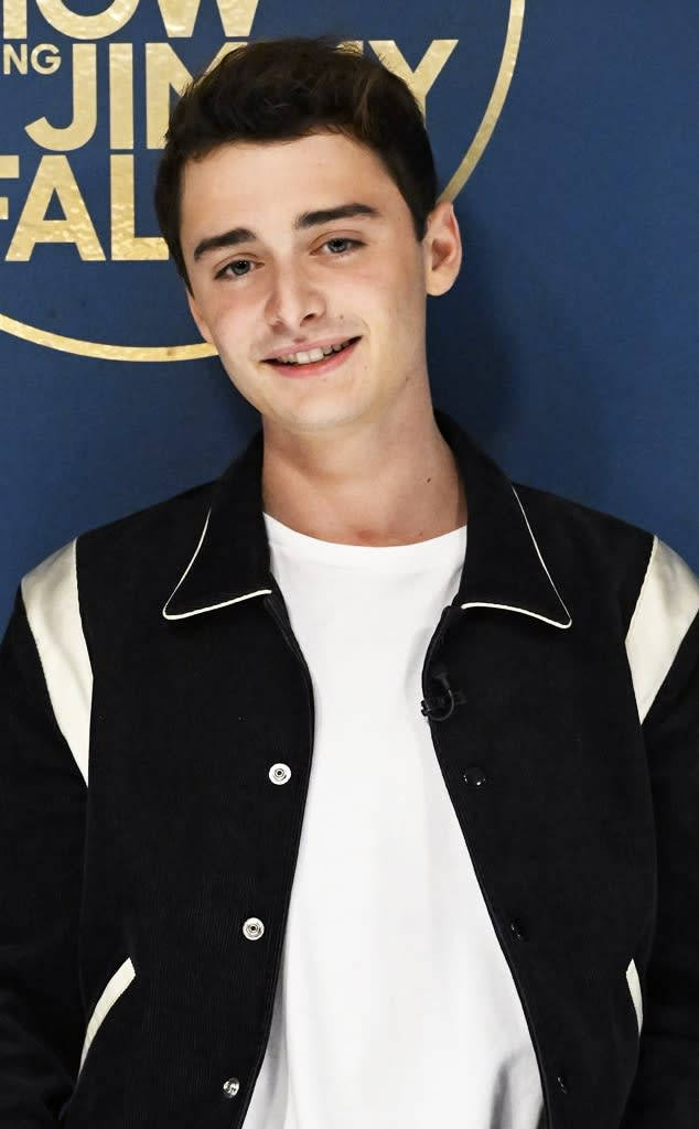 Closeup Noah Schnapp Against Wall Background