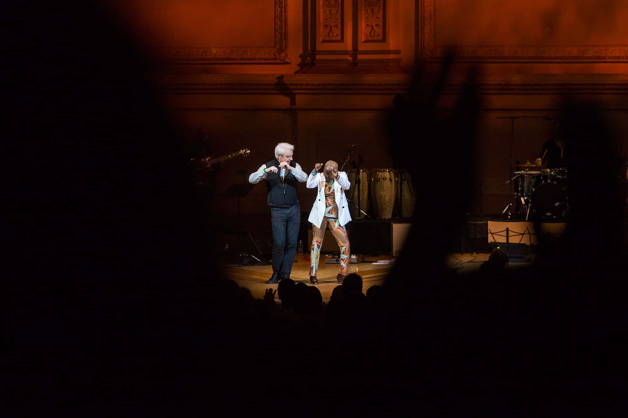 Closeup Of Talking-heads On A Brightly Lit Stage