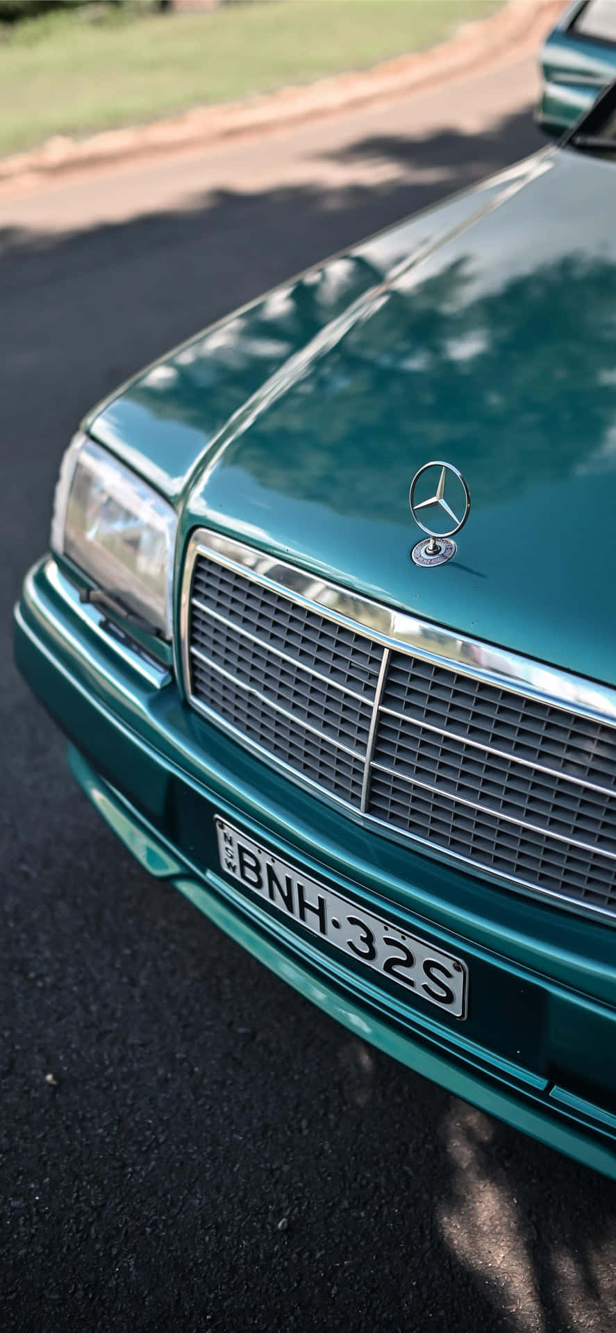 Closeup Old Mercedes Benz Emblem