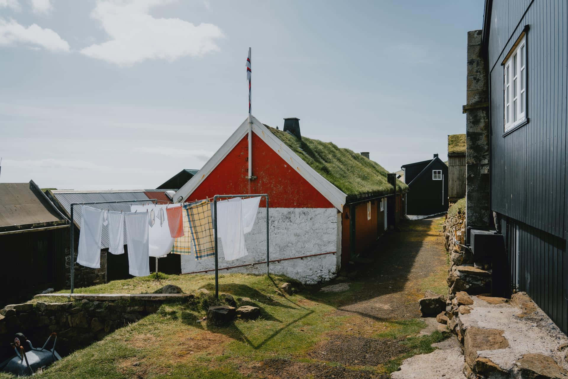 Clothesline With Laundry At Thorshavn Background