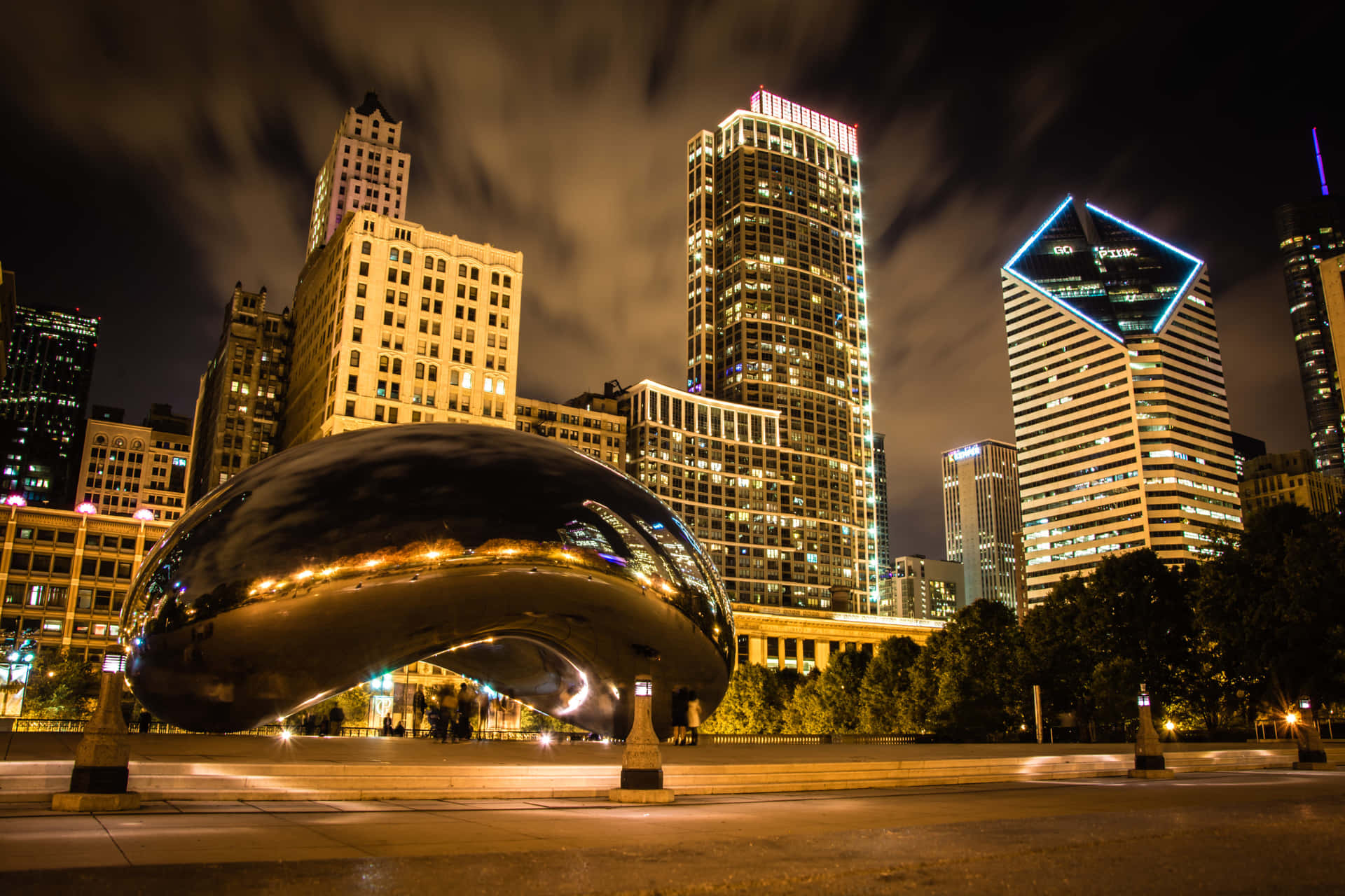 Cloud Gate And Chicago Buildings City Lights Background