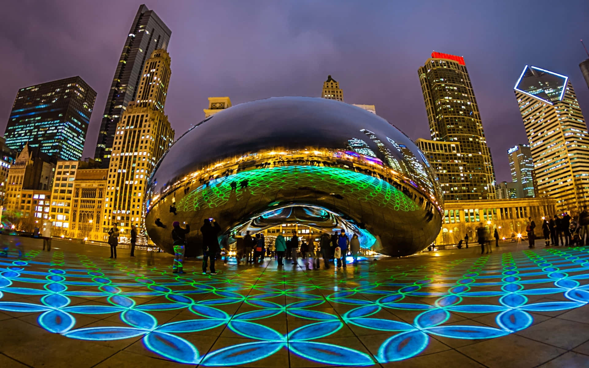 Cloud Gate On Sparkly Night In Millennium Park Background