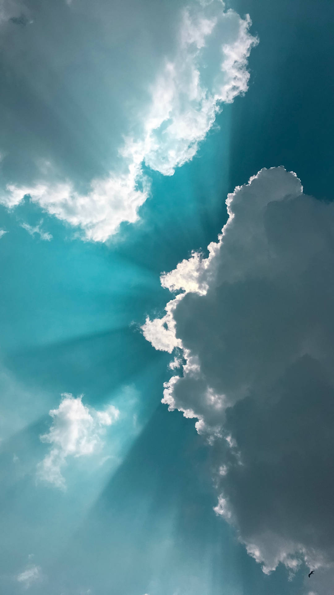Clouds In Turquoise Sky Background