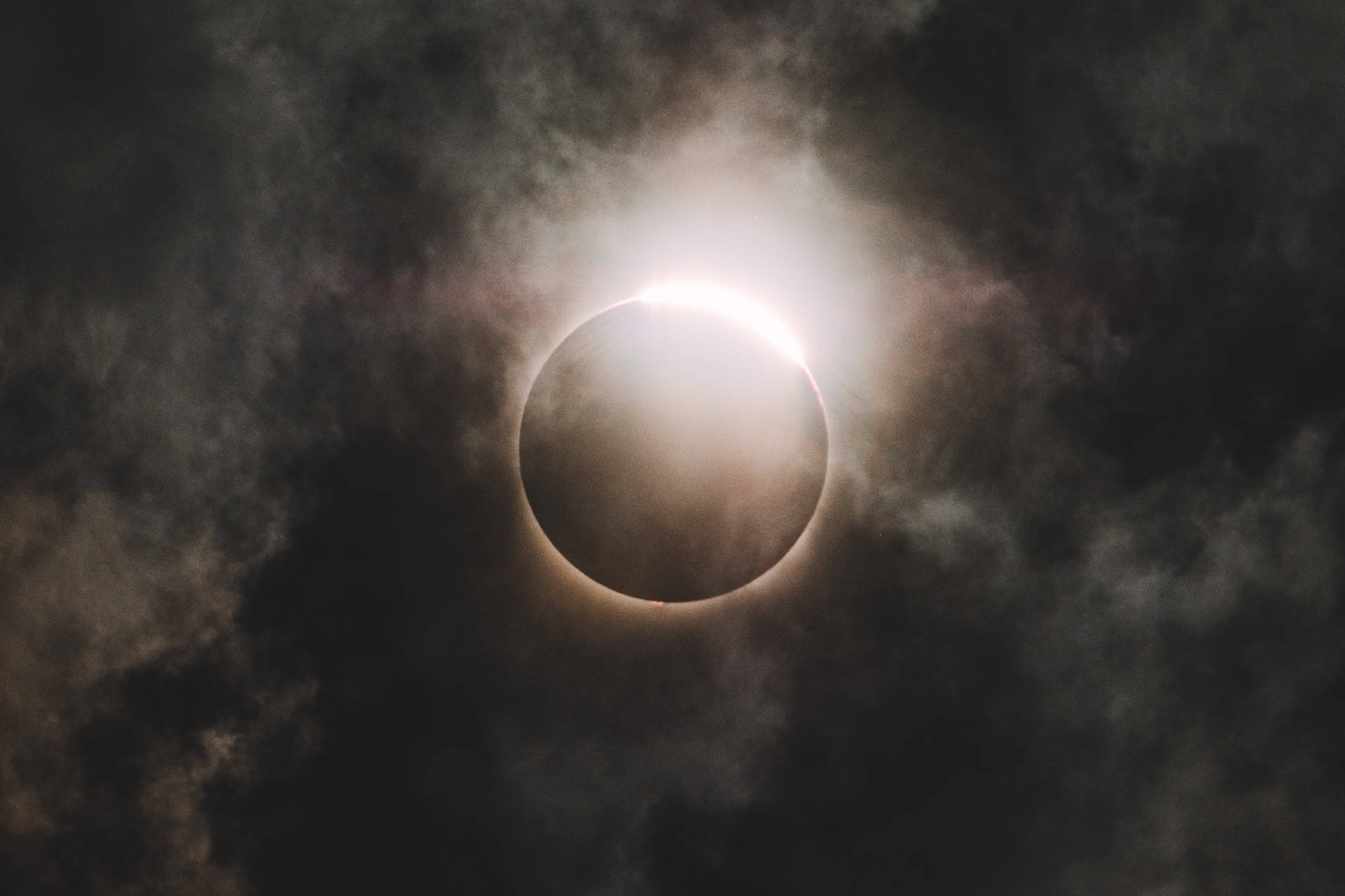 Cloudy Mid-day Solar Eclipse Background