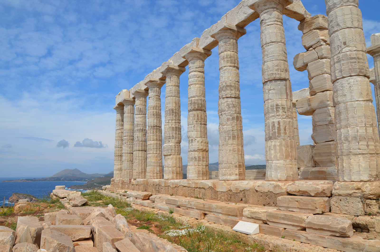 Cloudy Sky Over Cape Sounion Background