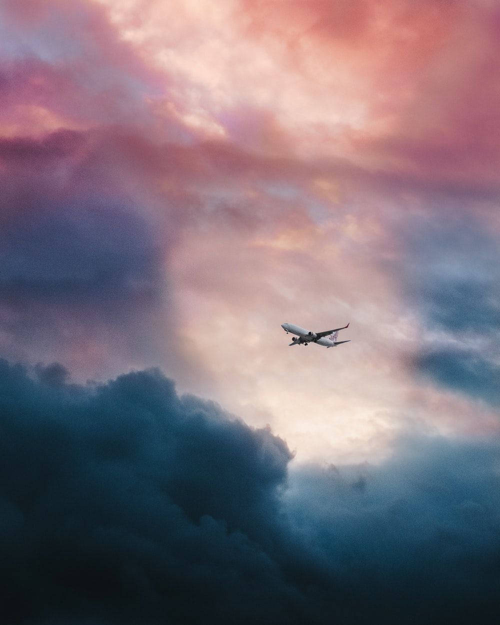 Cloudy Sky With Airplane Android Background